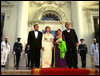 Arriving for the State Dinner President George W. Bush, Philippine President Gloria Macapagal-Arroyo, her husband Jose Miguel Arroyo and Laura Bush greet the press from the North Portico of the White House Monday, May 19, 2003.